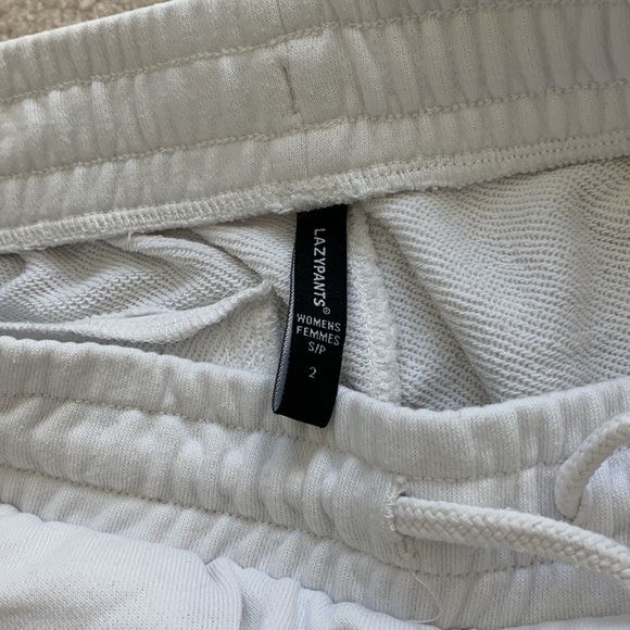 white sweatpants with red white and blue stripe detail - Picture 3 of 3